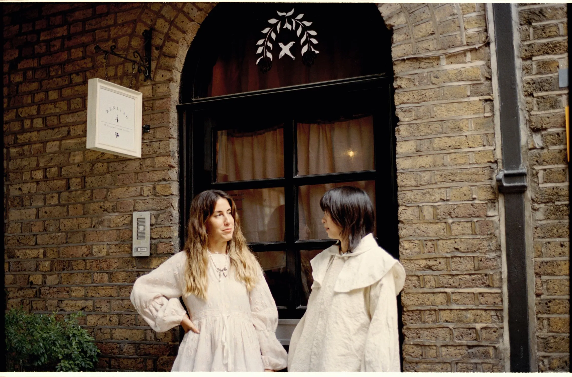 Camila Campos with her boss and designer Renli Su
